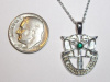 #18 Medium Wht Gold SF Crest Pendant With Emerald